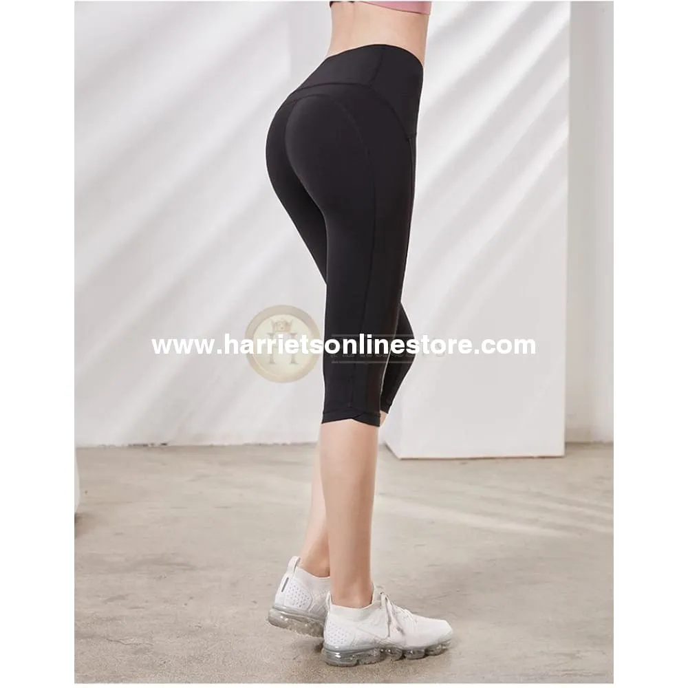 Exercise Pants High Rise Crop With Asymmetrical Side Panels.