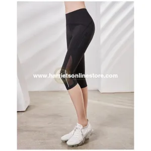 Exercise Pants High Rise Crop With Asymmetrical Side Panels.